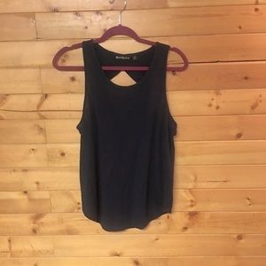 Navy Bl ue Athleta Loose T-Shirt, Round collar, Key Hole Back.  Sleeveless.  M